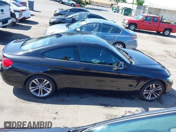 2014 BMW 4 Series 428i xDrive with VIN WBA3N9C53EK244907, listed as a IAAI auction lot 42380025 with 71,431 mi miles and . Bid and sale history available at DreamBid. Image 13.