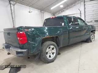 2015 Chevrolet Silverado 1500 LT with VIN 3GCUKREC5FG252317, listed as a IAAI auction lot 41931394 with 91,579 mi miles. Bid and sale history available at carsss.com. Image 4.