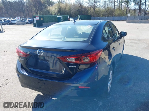 2016 Mazda Mazda3 i Grand Touring with VIN JM1BM1X75G1288611, listed as a IAAI auction lot 42001357 with 107,830 mi miles. Bid and sale history available at carsss.com. Image 4.