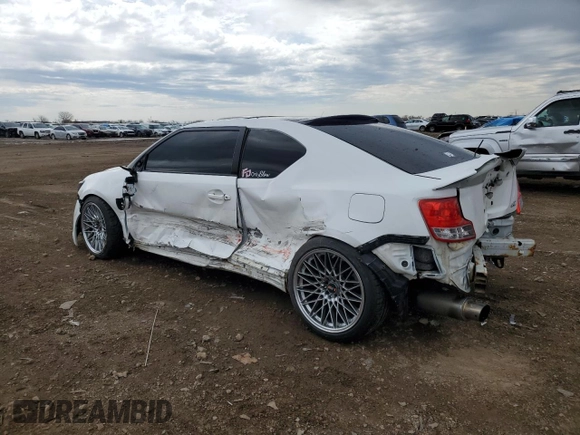 2012 Scion tC z VIN JTKJF5C71C3032427, wystawiony jako Copart lot #54160695 z przebiegiem 59 826 mil mil oraz Szkoda całkowita • Salvage title. Historia ofert i sprzedaży dostępna na DreamBid. Obrazek 2.