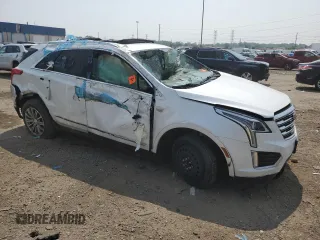 2017 Cadillac XT5 Luxury FWD with VIN 1GYKNBRS2HZ296859, listed as a Copart auction lot 64982445 with 30,765 mi miles and Salvage title. Bid and sale history available at DreamBid. Image 4.