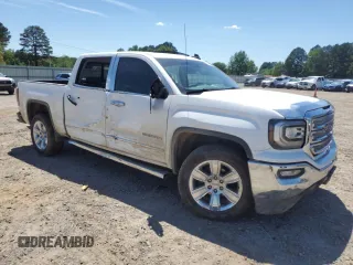 2017 GMC Sierra 1500 SLT with VIN 3GTP1NEC0HG401941, listed as a Copart auction lot 54114205 with 149,737 mi miles and Salvage title. Bid and sale history available at DreamBid. Image 4.