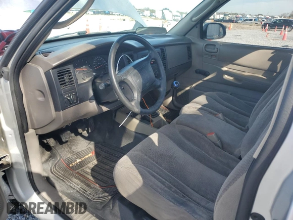 2003 Dodge Dakota with VIN 1D7FL16X23S122093, listed as a Copart auction lot 87394974 with 264,510 mi miles and Salvage Title. Bid and sale history available at carsss.com. Image 8.
