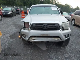 2012 Toyota Tacoma with VIN 5TFUX4EN2CX011263, listed as a IAAI auction lot 42670078 with 164,922 mi miles and . Bid and sale history available at DreamBid. Image 12.