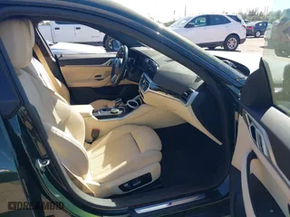 2022 BMW 4 Series 430i with VIN WBA63AV02NFM97103, listed as a IAAI auction lot 41756950 with 31,451 mi miles. Bid and sale history available at carsss.com. Image 5.
