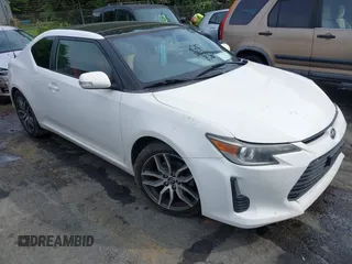 2014 Scion tC z VIN JTKJF5C77E3082073, wystawiony jako IAAI lot #42107615 z przebiegiem 223 895 mil mil oraz . Historia ofert i sprzedaży dostępna na DreamBid. Obrazek 1.
