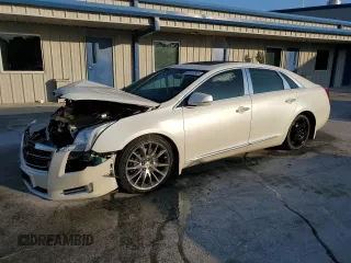 2014 Cadillac XTS Platinum with VIN 2G61W5S84E9153242, listed as a Copart auction lot 88361685 with 141,401 mi miles and Salvage Title. Bid and sale history available at DreamBid. Image 1.