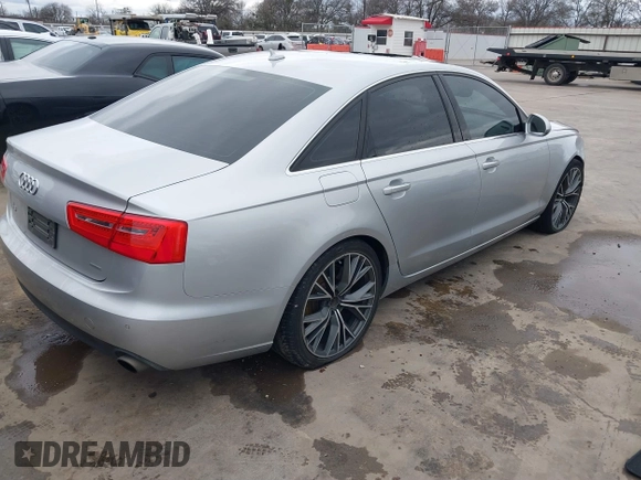 2015 Audi A6 Premium Plus z VIN WAUGFAFC8FN032627, wystawiony jako IAAI lot #41270302 z przebiegiem 82 104 mil mil oraz . Historia ofert i sprzedaży dostępna na DreamBid. Obrazek 4.