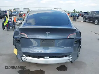 2023 Tesla Model Y Long Range with VIN 7SAYGDEEXPA078629, listed as a IAAI auction lot 42046354 with 27,245 mi miles and . Bid and sale history available at DreamBid. Image 17.
