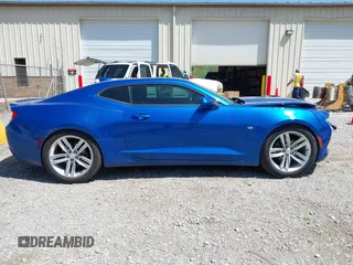 2018 Chevrolet Camaro 1LT z VIN 1G1FB1RS5J0101768, wystawiony jako IAAI lot #41990965 z przebiegiem 82 492 mil mil oraz . Historia ofert i sprzedaży dostępna na DreamBid. Obrazek 13.