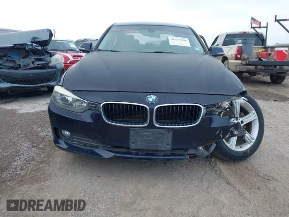 2015 BMW 3 Series 320i with VIN WBA3B1C53FK138310, listed as a IAAI auction lot 41677208 with 57,891 mi miles. Bid and sale history available at carsss.com. Image 12.