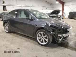 2024 Tesla Model Y Long Range with VIN 7SAYGDEE5RA237687, listed as a Copart auction lot 48366825 with 24,650 mi miles and Salvage Title. Bid and sale history available at DreamBid. Image 4.