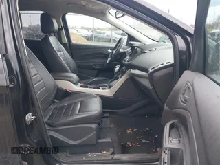 2013 Ford Escape SEL with VIN 1FMCU9HX9DUA69853, listed as a IAAI auction lot 42037021 with 132,166 mi miles and . Bid and sale history available at DreamBid. Image 5.