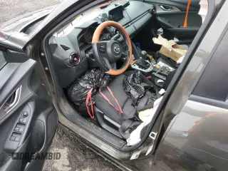 2018 Mazda CX-3 Sport z VIN JM1DKFB77J0312732, wystawiony jako Copart lot #45720065 z przebiegiem 99 866 mil mil oraz Szkoda całkowita • Salvage title. Historia ofert i sprzedaży dostępna na DreamBid. Obrazek 8.