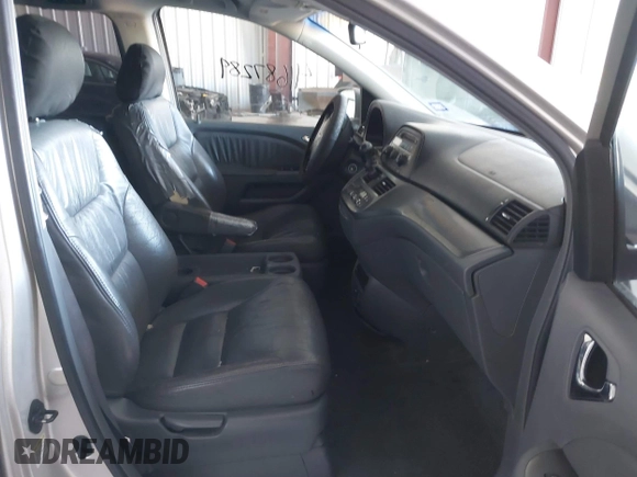 2006 Honda Odyssey EX-L z VIN 5FNRL387X6B413006, wystawiony jako IAAI lot #41687289 z przebiegiem 192 701 mil mil oraz . Historia ofert i sprzedaży dostępna na DreamBid. Obrazek 5.