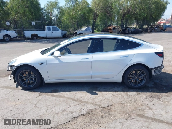 2018 Tesla Model 3 Long Range Battery with VIN 5YJ3E1EAXJF108781, listed as a IAAI auction lot 41962628 with 61,208 mi miles and . Bid and sale history available at DreamBid. Image 15.