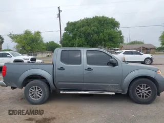 2016 Nissan Frontier SV z VIN 1N6AD0ER2GN730728, wystawiony jako IAAI lot #41837413 z przebiegiem 120 037 mil mil oraz . Historia ofert i sprzedaży dostępna na DreamBid. Obrazek 14.