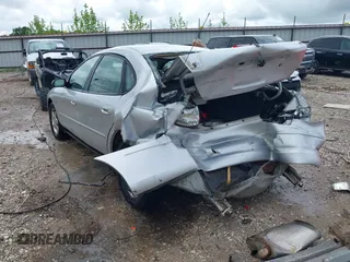 2003 Ford Taurus SES Standard z VIN 1FAFP55S43G270637, wystawiony jako IAAI lot #42205556 z przebiegiem 171 286 mil mil oraz . Historia ofert i sprzedaży dostępna na DreamBid. Obrazek 3.