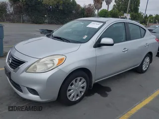 2012 Nissan Versa SV with VIN 3N1CN7AP8CL871788, listed as a IAAI auction lot 42819687 with 71,033 mi miles and . Bid and sale history available at DreamBid. Image 2.