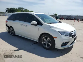 2019 Honda Odyssey Touring with VIN 5FNRL6H86KB089055, listed as a Copart auction lot 56980975 with 154,842 mi miles and Salvage title. Bid and sale history available at DreamBid. Image 4.