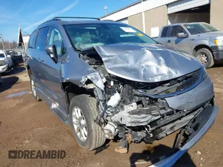 2021 Chrysler Voyager LXI with VIN 2C4RC1DG1MR530758, listed as a IAAI auction lot 41639879 with 97,706 mi miles. Bid and sale history available at carsss.com. Image 1.
