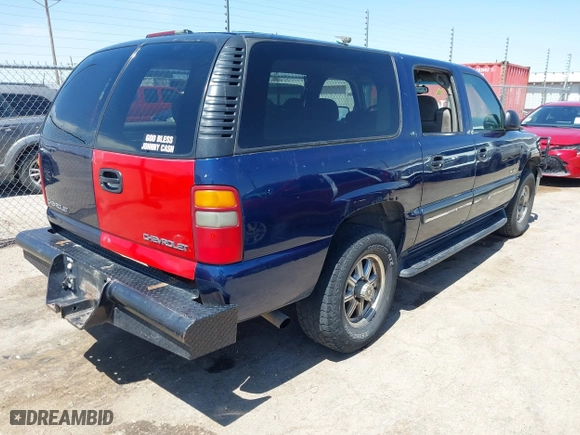 2000 Chevrolet Suburban LS with VIN 3GNEC16T1YG131974, listed as a IAAI auction lot 41983971 with 245,767 mi miles. Bid and sale history available at carsss.com. Image 4.