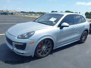 2016 Porsche Cayenne GTS z VIN WP1AD2A27GLA76018, wystawiony jako IAAI lot #42209515 z przebiegiem 49 432 mil mil oraz . Historia ofert i sprzedaży dostępna na DreamBid. Obrazek 2.