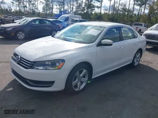 2013 Volkswagen Passat SE w/Sunroof with VIN 1VWBH7A30DC080176, listed as a IAAI auction lot 40941070 with 155,815 mi miles. Bid and sale history available at carsss.com. Image 2.