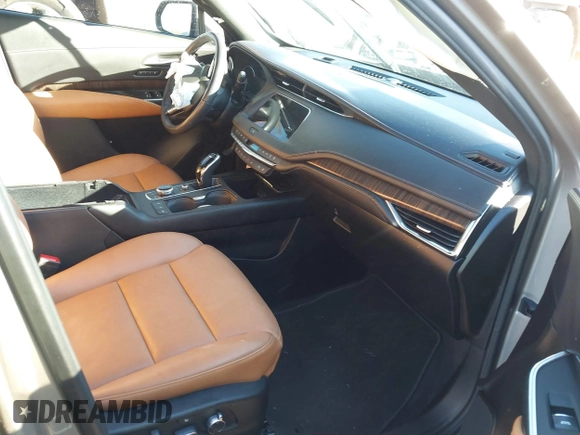 2023 Cadillac XT4 FWD Premium Luxury with VIN 1GYFZCR46PF191870, listed as a IAAI auction lot 40902968 with 25,653 mi miles and . Bid and sale history available at DreamBid. Image 5.