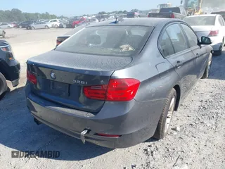 2014 BMW 3 Series 328i xDrive with VIN WBA3B5C59EP544228, listed as a IAAI auction lot 42738694 with 99,963 mi miles and . Bid and sale history available at DreamBid. Image 4.