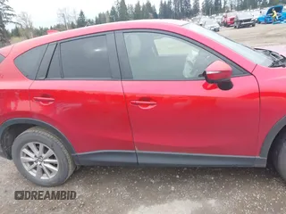 2016 Mazda CX-5 Touring with VIN JM3KE4CY2G0894930, listed as a IAAI auction lot 41906809 with 123,125 mi miles. Bid and sale history available at carsss.com. Image 13.