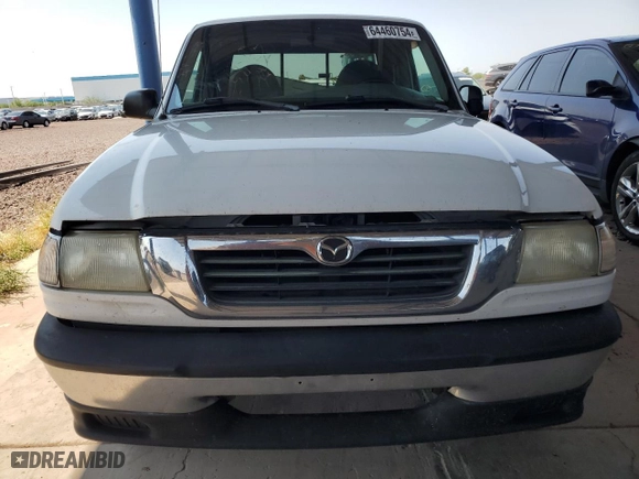 2000 Mazda B-Series 2WD Truck SE with VIN 4F4YR16C6YTM11839, listed as a Copart auction lot 64460754 with 245,958 mi miles and Salvage Title. Bid and sale history available at carsss.com. Image 5.