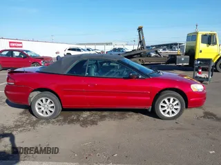 2005 Chrysler Sebring GTC with VIN 1C3EL75R35N690113, listed as a IAAI auction lot 41745228 with 144,868 mi miles and . Bid and sale history available at DreamBid. Image 13.
