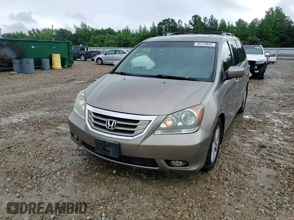 2010 Honda Odyssey Touring z VIN 5FNRL3H97AB082525, wystawiony jako Copart lot #56410845 z przebiegiem 94 819 mil mil oraz Szkoda całkowita • Salvage title. Historia ofert i sprzedaży dostępna na DreamBid. Obrazek 13.