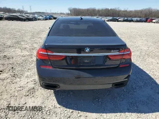 2016 BMW 7 Series 750i with VIN WBA7F0C57GGL99153, listed as a Copart auction lot 45475755 with 140,328 mi miles and Salvage title. Bid and sale history available at DreamBid. Image 6.