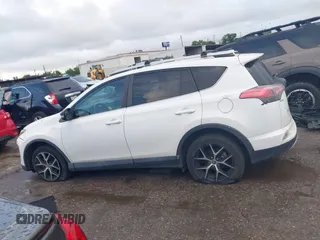 2016 Toyota RAV4 SE with VIN 2T3NFREV6GW262348, listed as a IAAI auction lot 42074087 with 114,791 mi miles and . Bid and sale history available at DreamBid. Image 14.