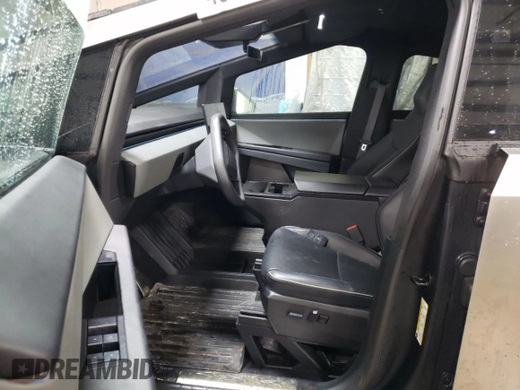 2024 Tesla Cybertruck с VIN 7G2CEHED2RA025693, выставлен на аукционе Copart как лот 45351295 с пробегом 11 786 миль миль и Списание • Salvage title. История ставок и продаж доступна на DreamBid. Изображение 7.