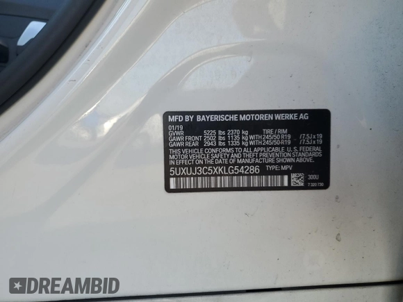 2019 BMW X4 xDrive30i with VIN 5UXUJ3C5XKLG54286, listed as a Copart auction lot 77333284 with 99,771 mi miles and Salvage Title. Bid and sale history available at carsss.com. Image 16.