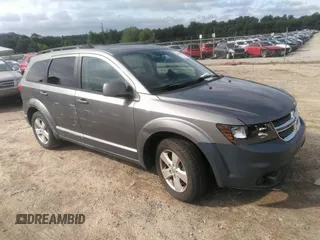 2012 Dodge Journey SXT with VIN 3C4PDCBG9CT153241, listed as a IAAI auction lot 42640265 with 184,719 mi miles and . Bid and sale history available at DreamBid. Image 1.