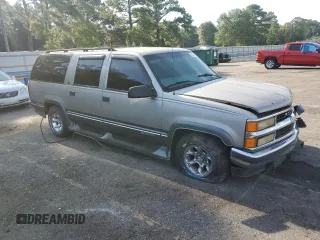 1999 Chevrolet Suburban with VIN 1GNEC16R9XJ490863, listed as a Copart auction lot 65938594 with 176,391 mi miles and Salvage Title. Bid and sale history available at carsss.com. Image 4.