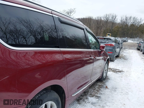 2017 Chrysler Pacifica Touring L Plus with VIN 2C4RC1EG6HR652908, listed as a IAAI auction lot 41381104 with 82,186 mi miles and . Bid and sale history available at DreamBid. Image 12.