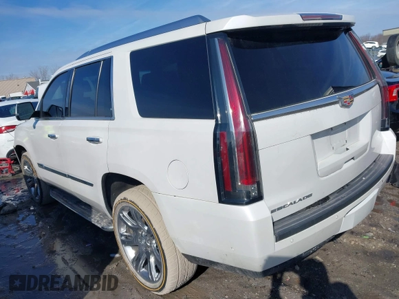 2017 Cadillac Escalade z VIN 1GYS4AKJ9HR233577, wystawiony jako IAAI lot #41524641 z przebiegiem 126 299 mil mil oraz . Historia ofert i sprzedaży dostępna na DreamBid. Obrazek 3.
