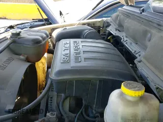 2002 Dodge 1500 z VIN 1D7HA16N52J236882, wystawiony jako IAAI lot #42543746 z przebiegiem 164 388 mil mil oraz . Historia ofert i sprzedaży dostępna na DreamBid. Obrazek 12.