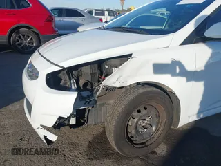 2016 Hyundai Accent SE z VIN KMHCT4AE0GU062891, wystawiony jako IAAI lot #40989721 z przebiegiem 128 457 mil mil oraz . Historia ofert i sprzedaży dostępna na DreamBid. Obrazek 6.