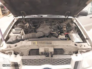 2004 Ford Explorer Sport Trac XLS with VIN 1FMZU77KX4UA39054, listed as a IAAI auction lot 41604708 with 256,789 mi miles. Bid and sale history available at carsss.com. Image 10.