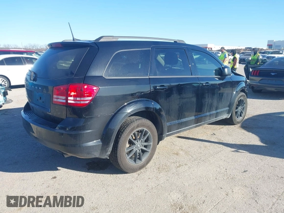 2020 Dodge Journey SE Value with VIN 3C4PDCAB7LT277627, listed as a IAAI auction lot 41729887 with 67,220 mi miles and . Bid and sale history available at carsss.com. Image 4.