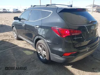 2017 Hyundai Santa Fe 2.4L z VIN 5NMZU3LB2HH037704, wystawiony jako IAAI lot #42113964 z przebiegiem 125 488 mil mil oraz . Historia ofert i sprzedaży dostępna na DreamBid. Obrazek 3.