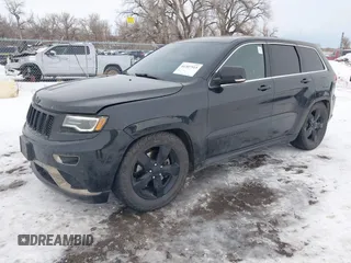 2016 Jeep Grand Cherokee Overland with VIN 1C4RJFCM5GC474718, listed as a IAAI auction lot 41307515 with 153,246 mi miles and . Bid and sale history available at DreamBid. Image 2.