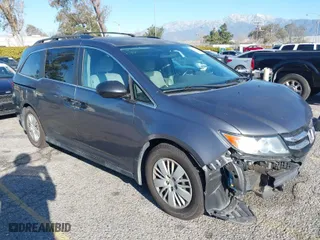 2014 Honda Odyssey LX with VIN 5FNRL5H23EB015067, listed as a IAAI auction lot 41760301 with 167,389 mi miles. Bid and sale history available at carsss.com. Image 1.