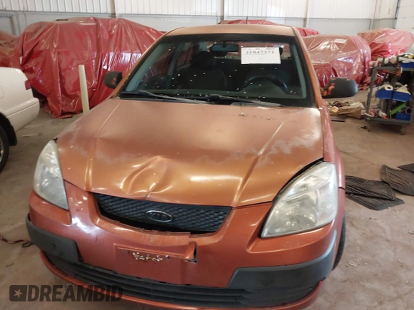 2009 Kia Rio LX with VIN KNADE223796547229, listed as a IAAI auction lot 41947371 with 153,061 mi miles and . Bid and sale history available at DreamBid. Image 12.